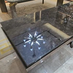 Sophisticated TV Stand with Dark Marble Top, Natural Wood Veneer Panels and Concealed Storage Drawers